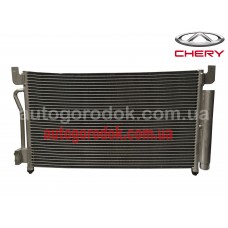 Радиатор кондиционера (оригинал) Chery Beat